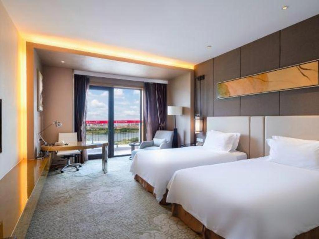 Haiyang Shenglong Jianguo Hotel Hai-yang-hsien Exteriör bild